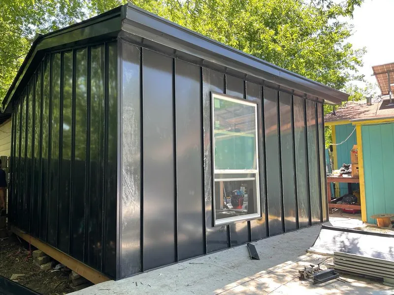 Black standing seam metal wall panels for Roof Inspection in Hull