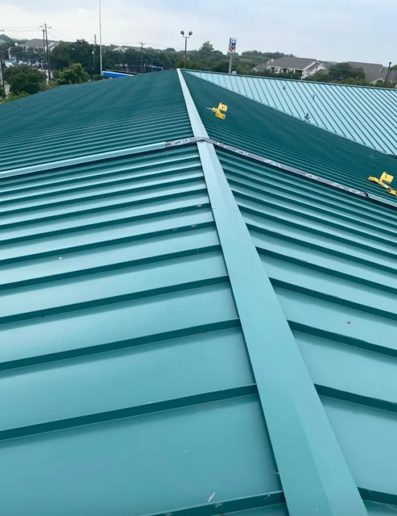 Green commercial metal roof ridge and valley for Metal Roof Repair in Hull